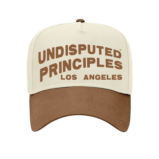 undisputed principles logo mid profile baseball cap in cream and brown